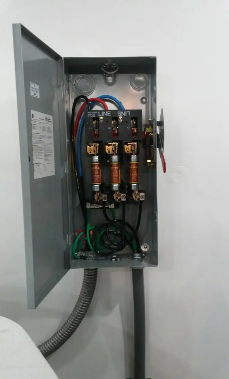 Three-phase disconnect switch installed for Smoke Detector Installation in Emmetsburg